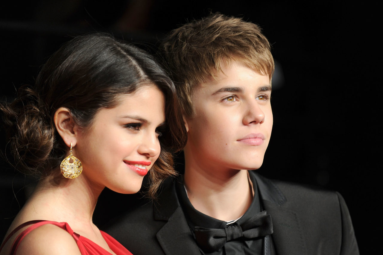 WEST HOLLYWOOD, CA - FEBRUARY 27: Singer/actress Selena Gomez and singer Justin Bieber arrive at the Vanity Fair Oscar party hosted by Graydon Carter held at Sunset Tower on February 27, 2011 in West Hollywood, California.