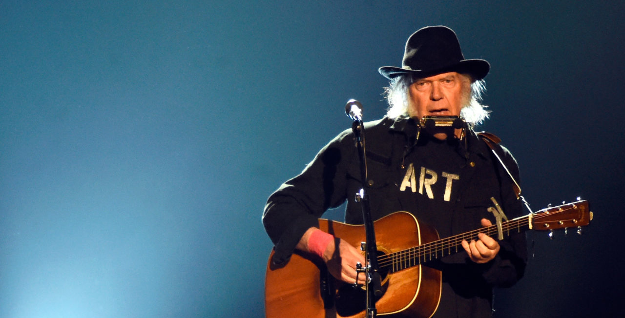 LOS ANGELES, CA - FEBRUARY 06: Singer Neil Young performs onstage at the 25th anniversary MusiCares 2015 Person Of The Year Gala honoring Bob Dylan at the Los Angeles Convention Center on February 6, 2015 in Los Angeles, California. The annual benefit raises critical funds for MusiCares' Emergency Financial Assistance and Addiction Recovery programs.