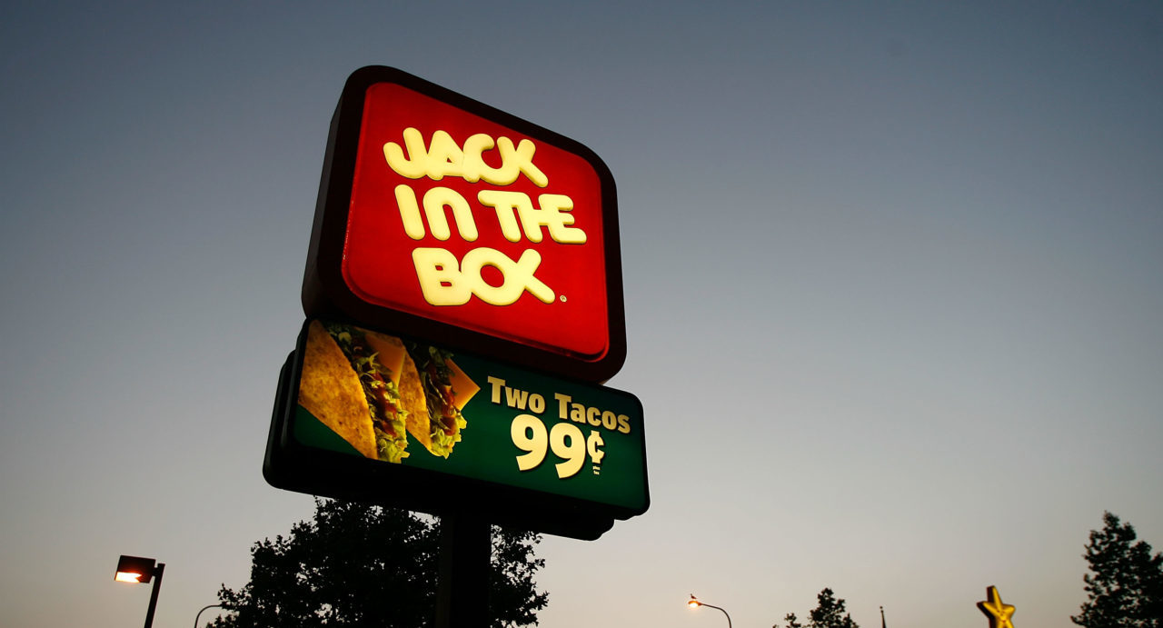 LOS ANGELES, CA - JULY 24: Jack In The Box and Carls Jr. fast-food restaurant signs glow July 24, 2008 on the Figueroa Street Corridor of South Los Angeles area of Los Angeles, California. The Los Angeles City Council committee has unanimously approved year-long moratorium on new fast-food restaurants in a 32-square-mile area, mostly in South Los Angeles, pending approval by the full council and the signature of Mayor Antonio Villaraigosa to make it the law. South LA has the highest concentration of fast-food restaurants of the city, about 400, and only a few grocery stores. L.A. Councilwoman Jan Perry proposed the measure to try to reduce health problems associated with a diet high in fast-food, like obesity and diabetes, which plague many of the half-million people living there.