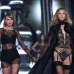 LONDON, ENGLAND - DECEMBER 02: Taylor Swift and Karlie Kloss walk the runway at the annual Victoria's Secret fashion show at Earls Court on December 2, 2014 in London, England.