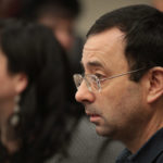 LANSING, MI - JANUARY 16: Larry Nassar sits with his attorney Shannon Smith as he appears in court to listen to victim impact statements prior to being sentenced after being accused of molesting about 100 girls while he was a physician for USA Gymnastics and Michigan State University, where he had his sports-medicine practice on January 16, 2018 in Lansing, Michigan. Nassar has pleaded guilty in Ingham County, Michigan, to sexually assaulting seven girls, but the judge is allowing all his accusers to speak. Nassar is currently serving a 60-year sentence in federal prison for possession of child pornography.